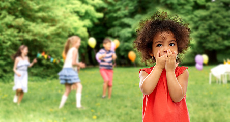 Image showing confused african american girl at birhtday party