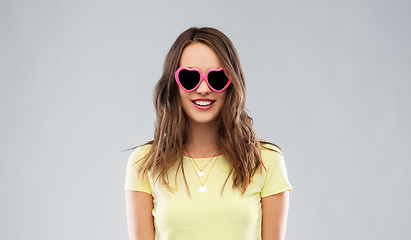 Image showing teenage girl in heart-shaped sunglasses