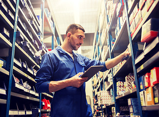 Image showing auto mechanic or smith with tablet pc at workshop