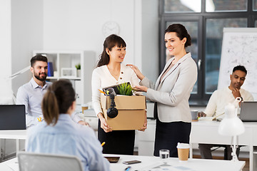 Image showing new female employee meeting colleagues at office