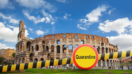 Image showing Prohibition yellow sign of quarantine on the background of Colosseum in Rome City, Italy.