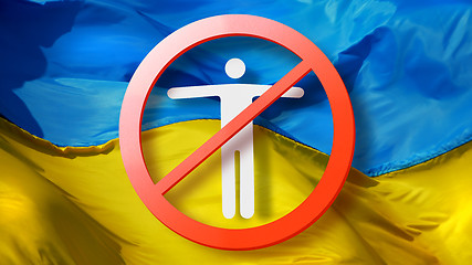 Image showing Warning sign with crossed out man on a background of Ukrainian flag.