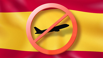 Image showing Warning sign with crossed out plane on the background of Spanish flag.