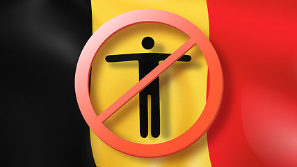 Image showing Warning sign with crossed out man on a background Belgian flag.