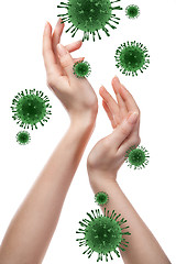 Image showing Womans hands and Coronavirus bacteria.