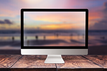 Image showing Computer screen with blurred sea background.