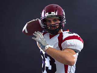 Image showing american football player throwing ball