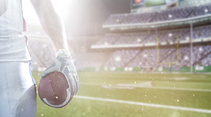 Image showing closeup American Football Player isolated on big modern stadium