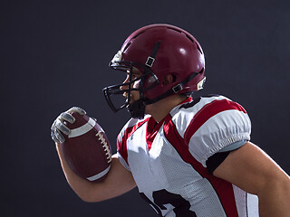 Image showing American football Player running with the ball