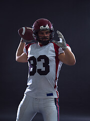 Image showing american football player throwing ball