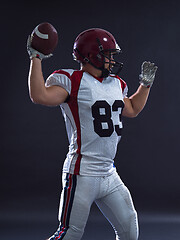 Image showing american football player throwing ball