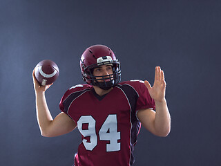 Image showing american football player throwing ball