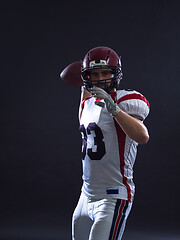 Image showing american football player throwing ball