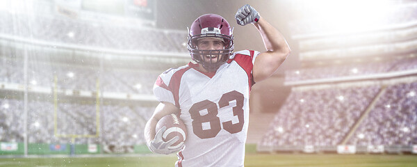 Image showing american football player celebrating touchdown