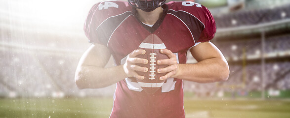 Image showing closeup American Football Player isolated on big modern stadium