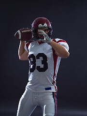 Image showing american football player throwing ball