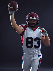 Image showing american football player throwing ball