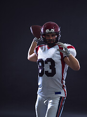 Image showing american football player throwing ball