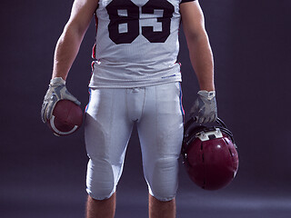 Image showing closeup American Football Player isolated on gray