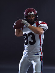 Image showing american football player throwing ball