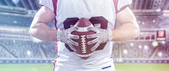 Image showing closeup American Football Player isolated on big modern stadium