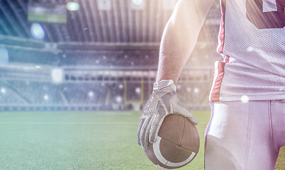 Image showing closeup American Football Player isolated on big modern stadium