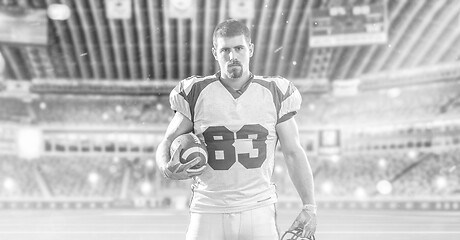 Image showing American Football Player isolated on big modern stadium field