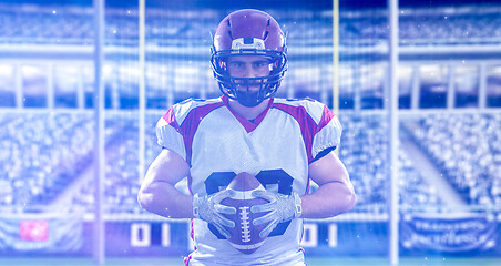 Image showing American Football Player isolated on big modern stadium field