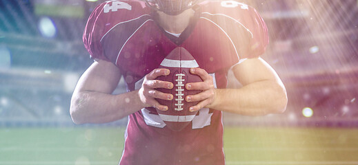 Image showing closeup American Football Player isolated on big modern stadium