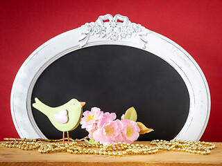 Image showing bird with a branch of blossoms easter holiday decoration backgro
