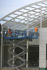 Image showing Workers on a platform