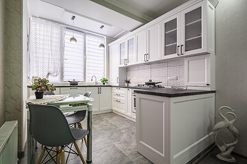 Image showing Modern white kitchen interior, front view