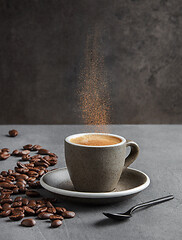 Image showing cinnamon splashes in a coffee mug