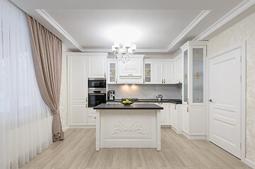 Image showing White luxury modern kitchen with island