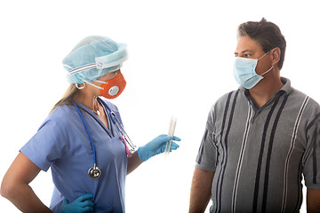 Image showing Patient being treaded by Healthcare Professional for infectious