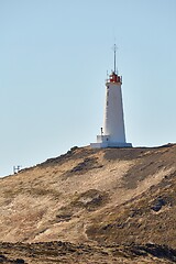 Image showing Old White Lighthouse on a hill