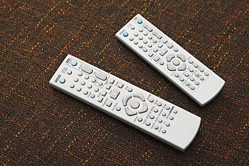 Image showing Remote controls for tv and dvd