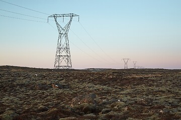 Image showing Electric lines leadin to the distance