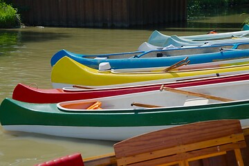 Image showing Canoes on the Riverside