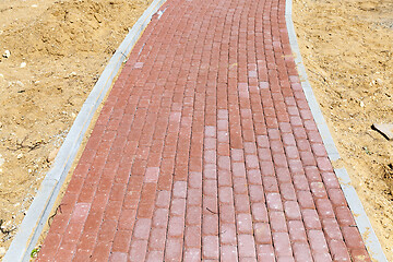 Image showing Paving the footpath
