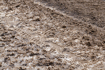 Image showing Dirty snow on the road