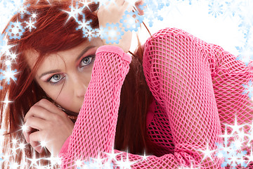 Image showing mysterious redhead in pink fishnet