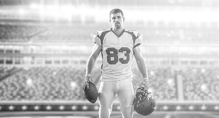 Image showing American Football Player isolated on big modern stadium field