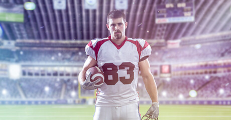 Image showing American Football Player isolated on big modern stadium field