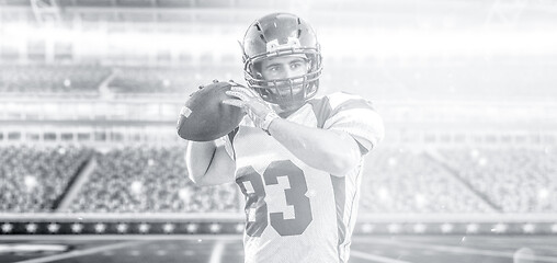 Image showing american football player throwing ball