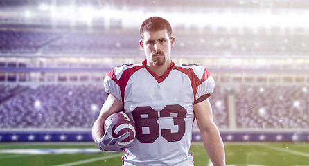 Image showing American Football Player isolated on big modern stadium field