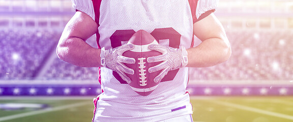 Image showing closeup American Football Player isolated on big modern stadium