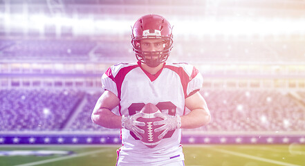 Image showing American Football Player isolated on big modern stadium field