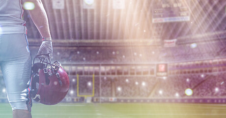 Image showing closeup American Football Player isolated on big modern stadium