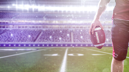 Image showing closeup American Football Player isolated on big modern stadium